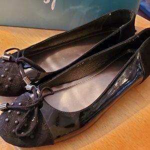 Black leather loafers size 7 made in italy with studs and bows